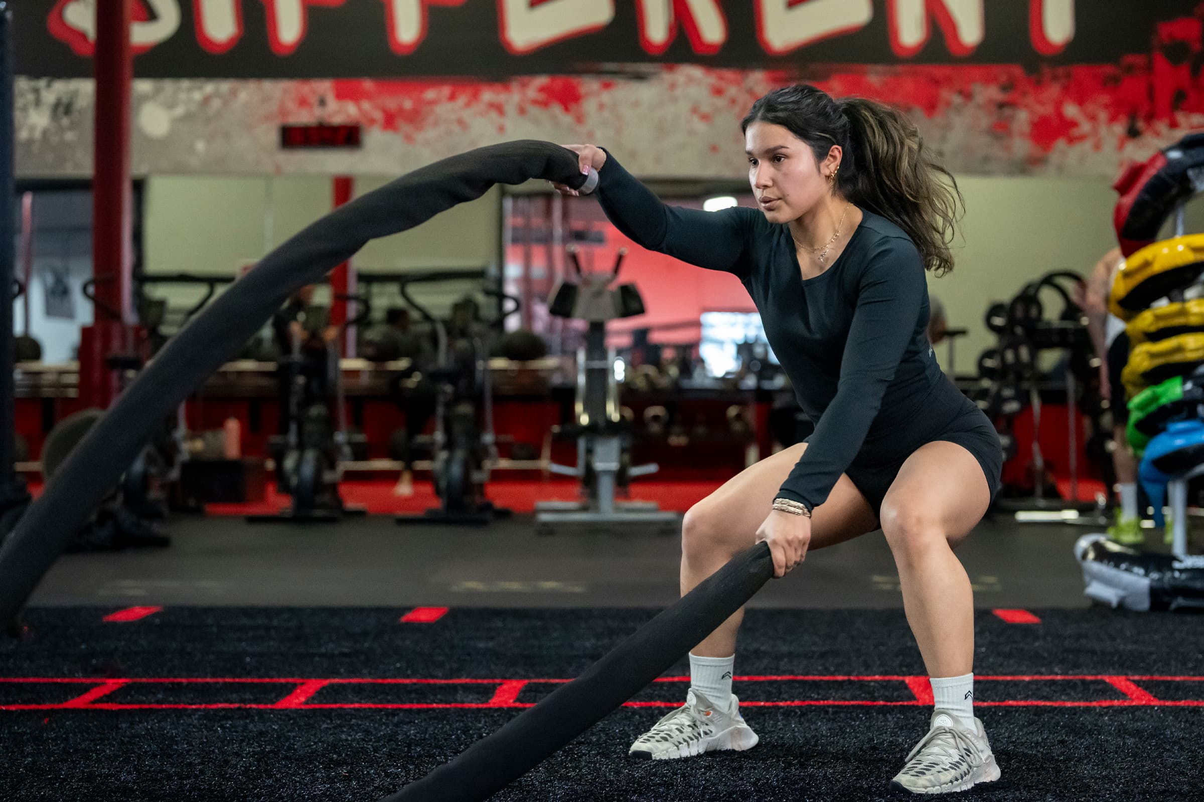 Women doing battle ropes